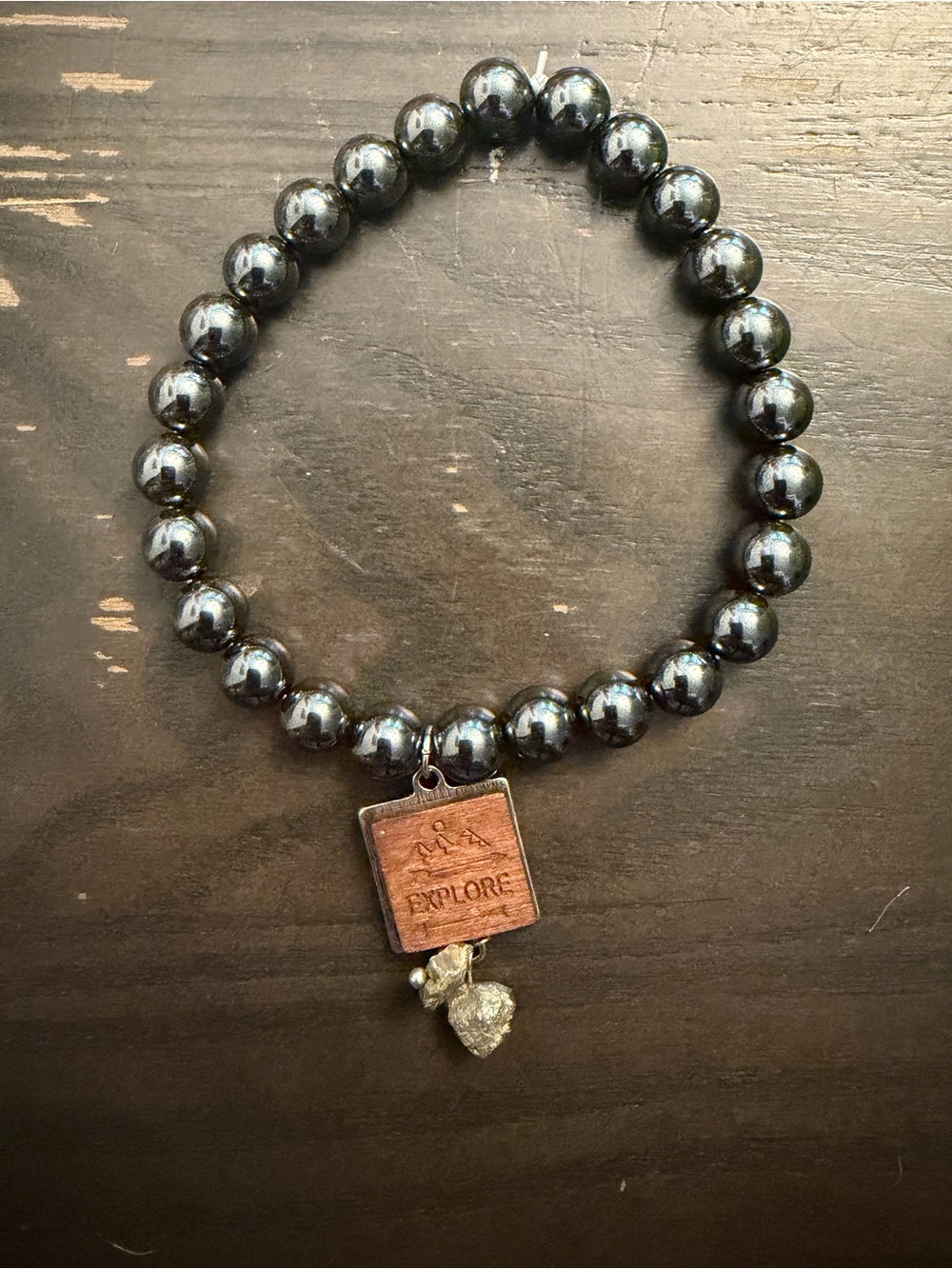Hematite Beaded Stretch Bracelet with 'Explore' Wooden Charm
